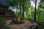 Enjoy the ambiance of the fire-pit while staying warm in the hot tub